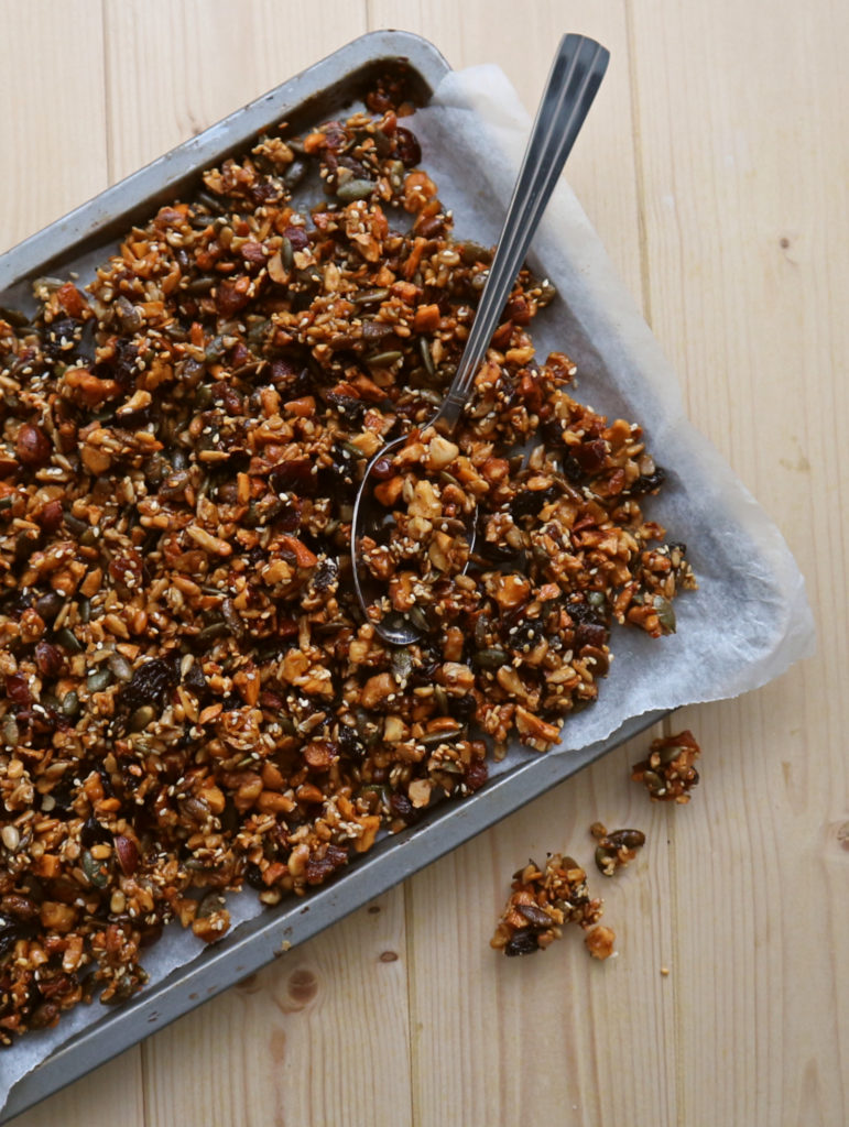Granola mixture in a baking pan.
