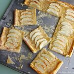French Apple Tart cut into pieces.