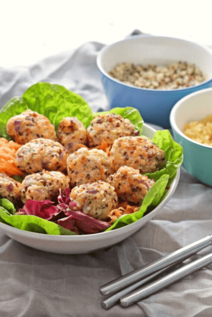 Simple Salmon Bites in white bowl with lettuce