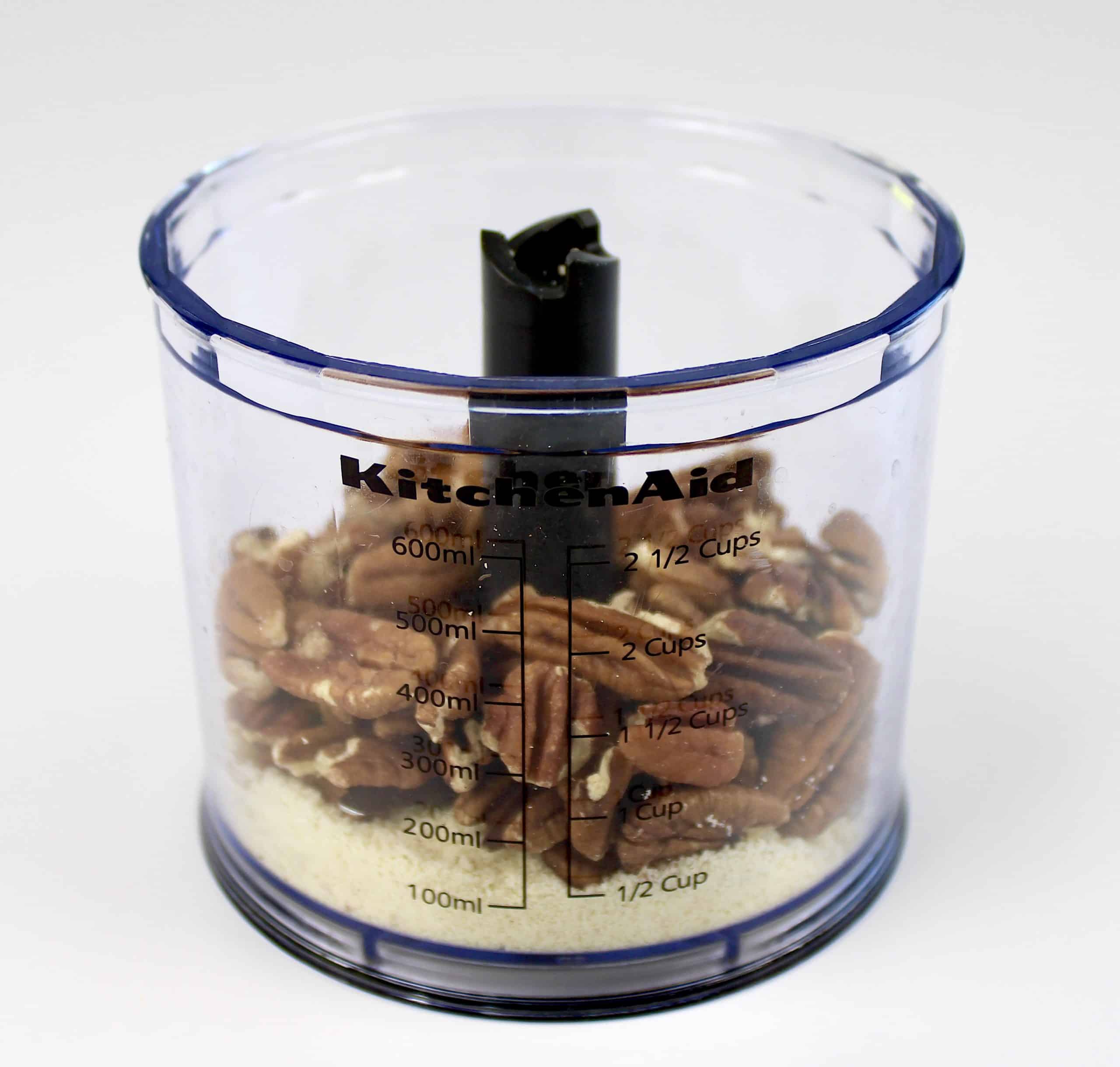 pecans and almond flour in mini chopper bowl unmixed