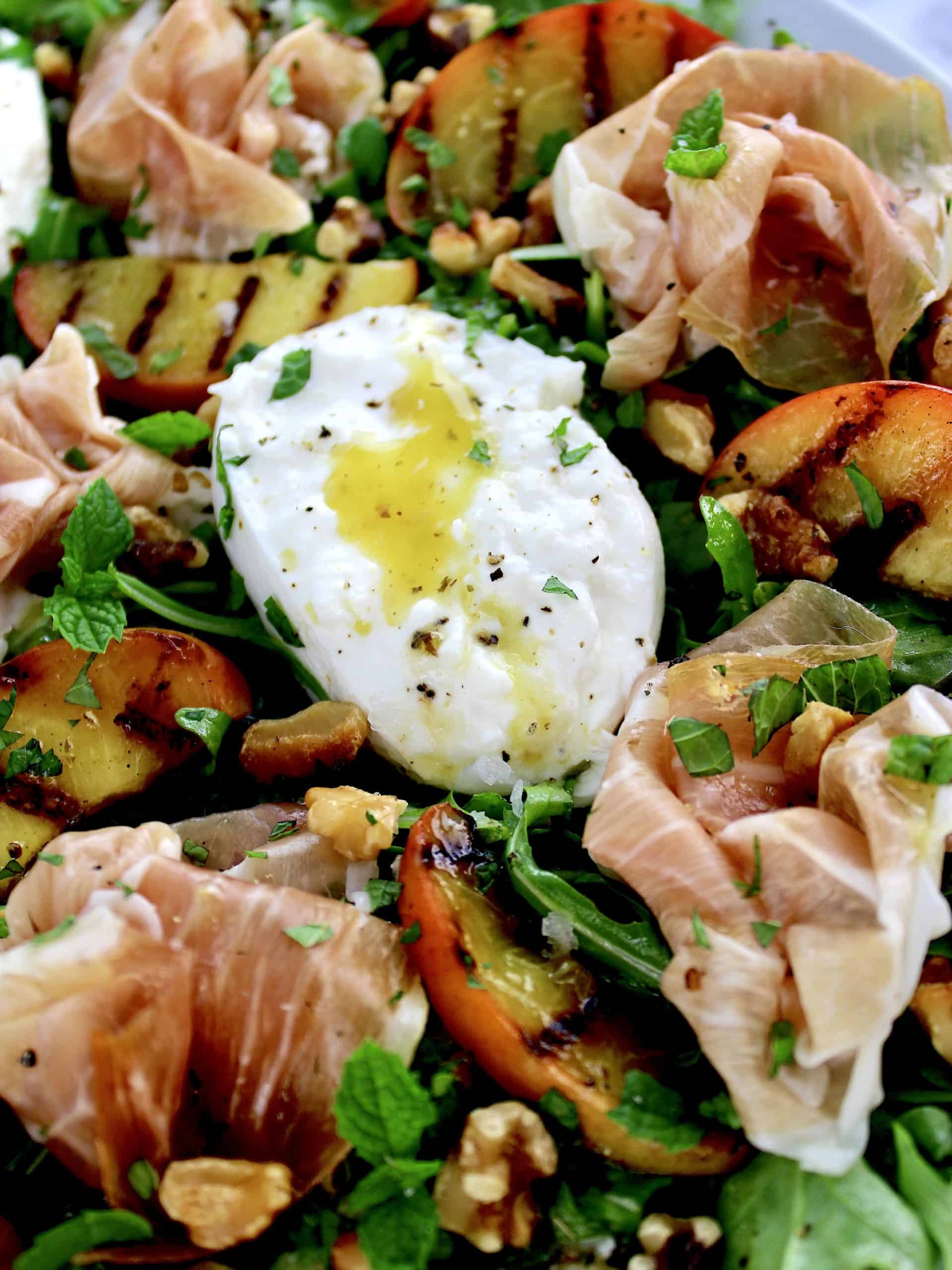 Grilled Peach Burrata Salad with Prosciutto closeup of burrata