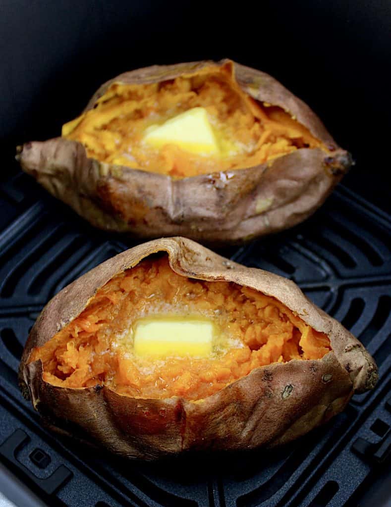 2 Air Fryer Sweet Potato in basket with butter