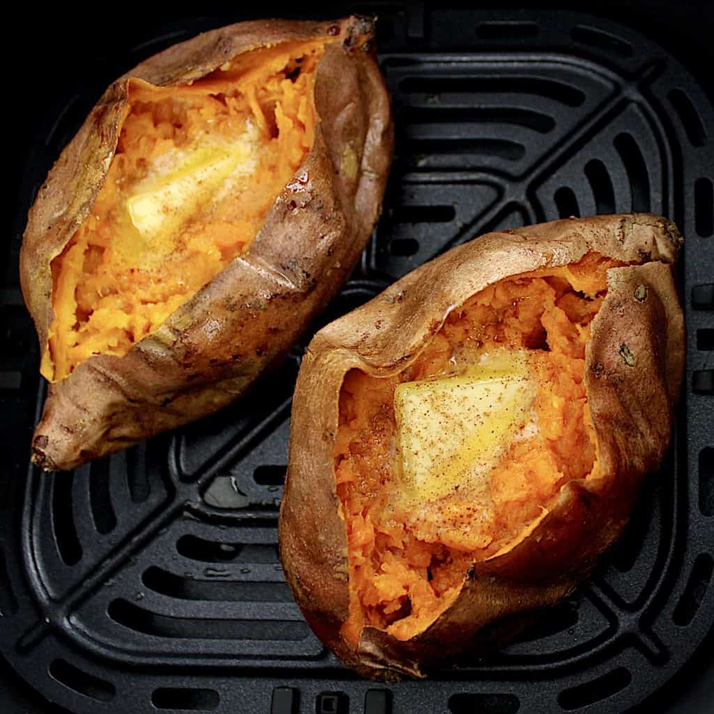 2 Air Fryer Sweet Potato in basket with butter