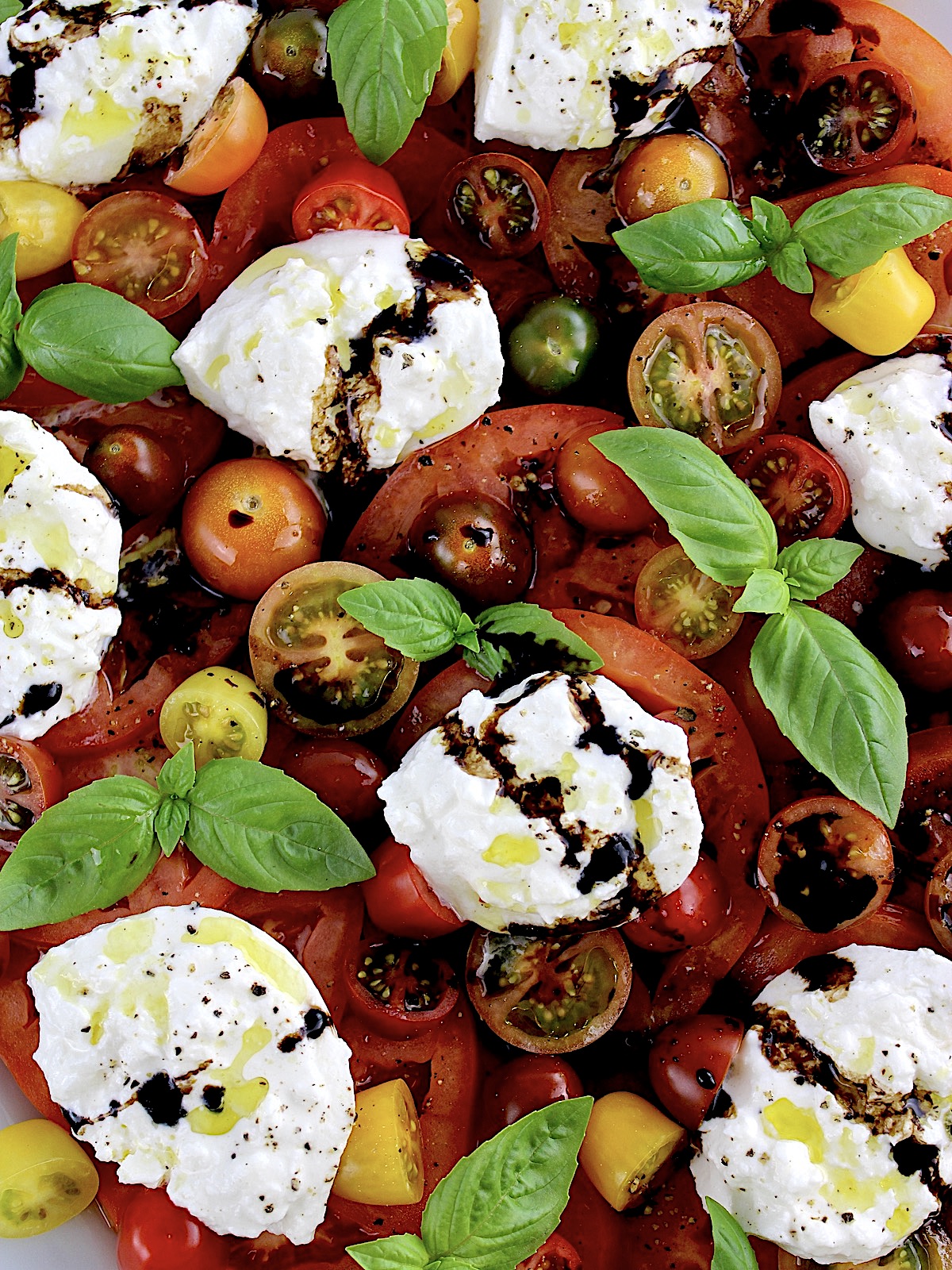 Burrata Caprese with fresh basil and balsamic reduction