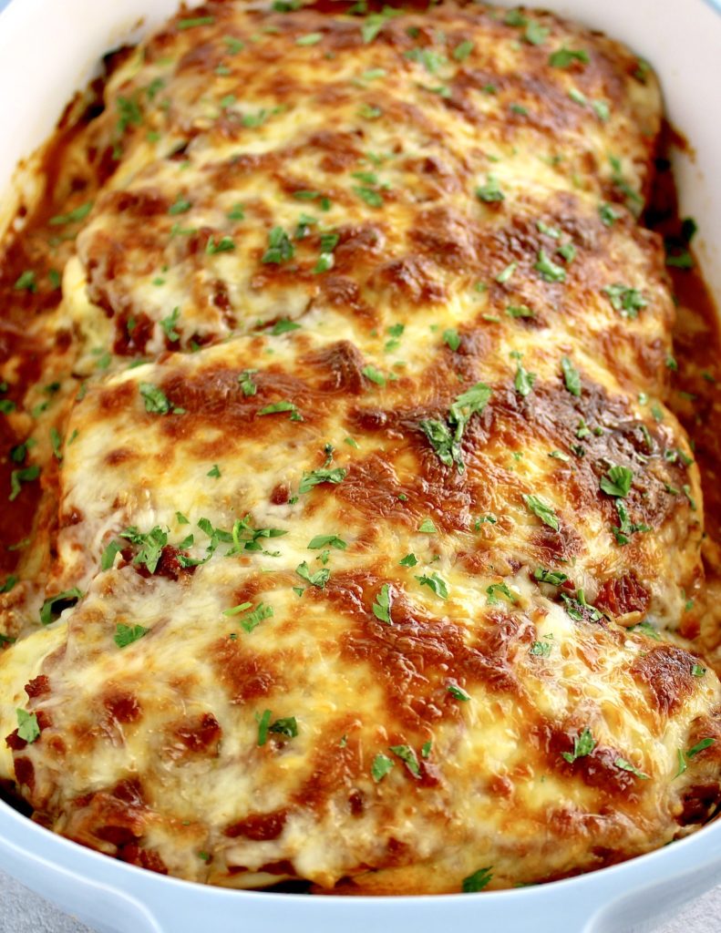 Eggplant Lasagna in casserole with chopped parsley on top