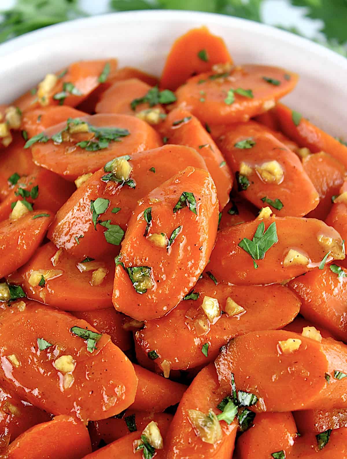 closeup of Glazed Carrots in white bowl
