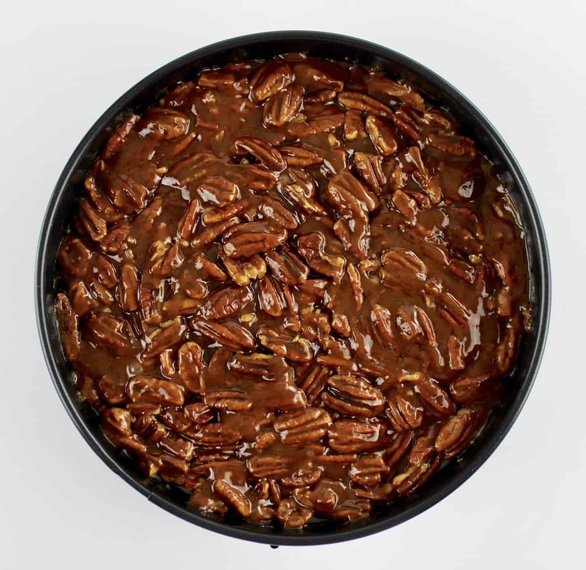 overhead view of Pecan Pie Cheesecake in springform pan