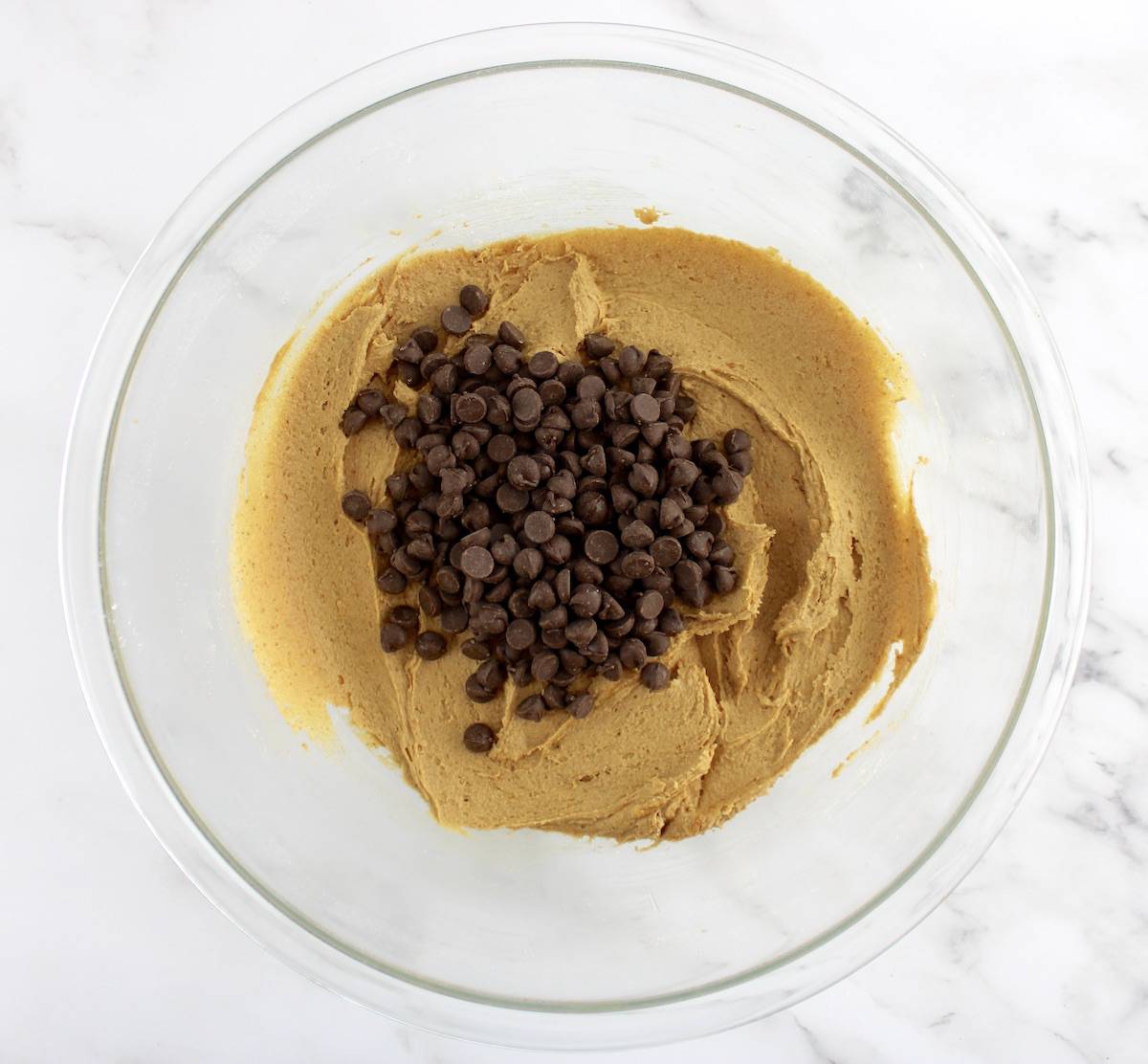 Gluten Free Pumpkin Cookie dough with chocolate chips in glass bowl