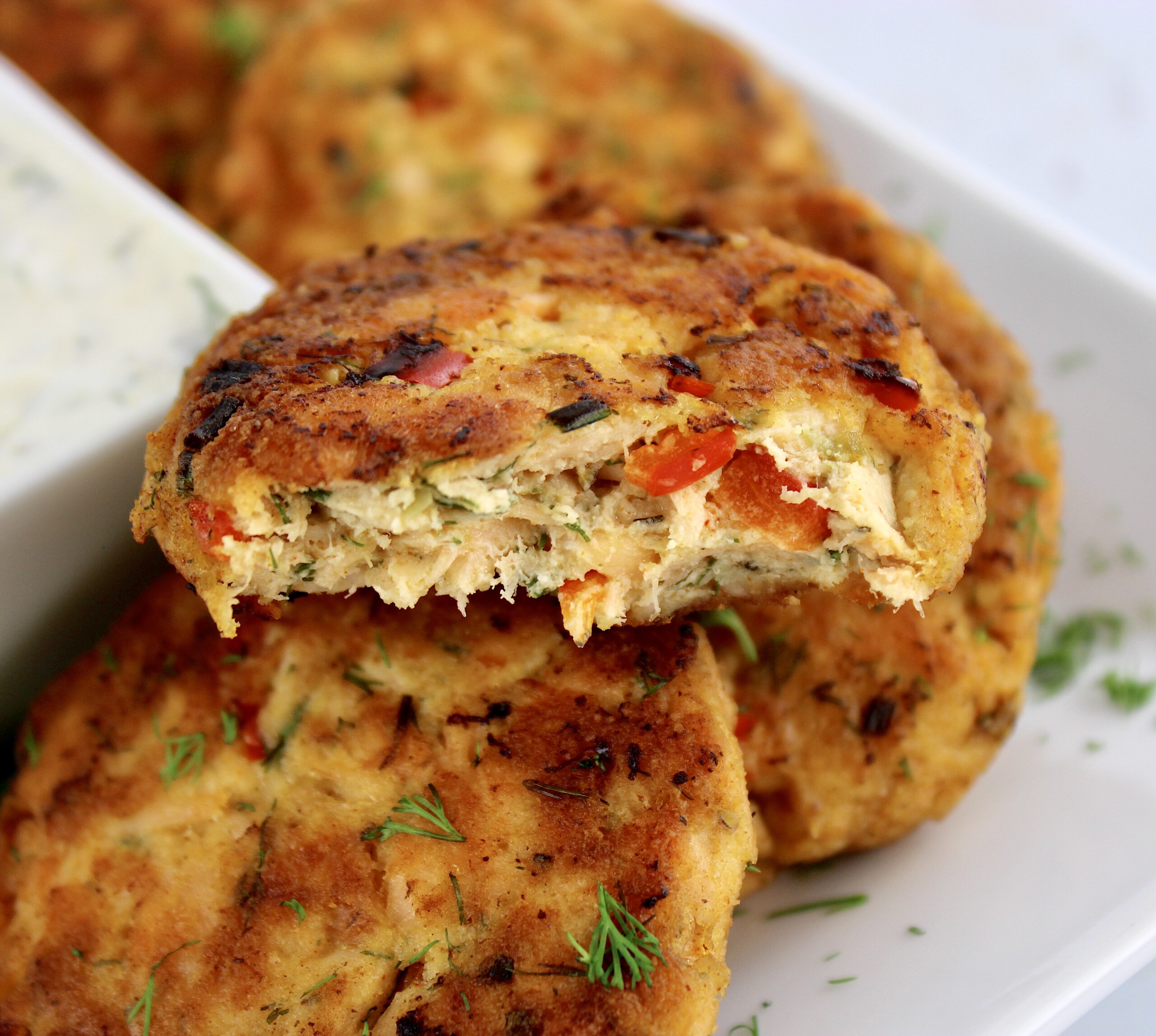 closeup of salmon patty cut in half
