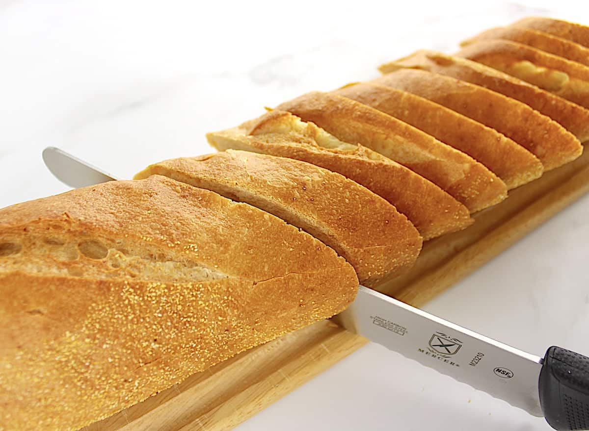 Italian loaf being sliced