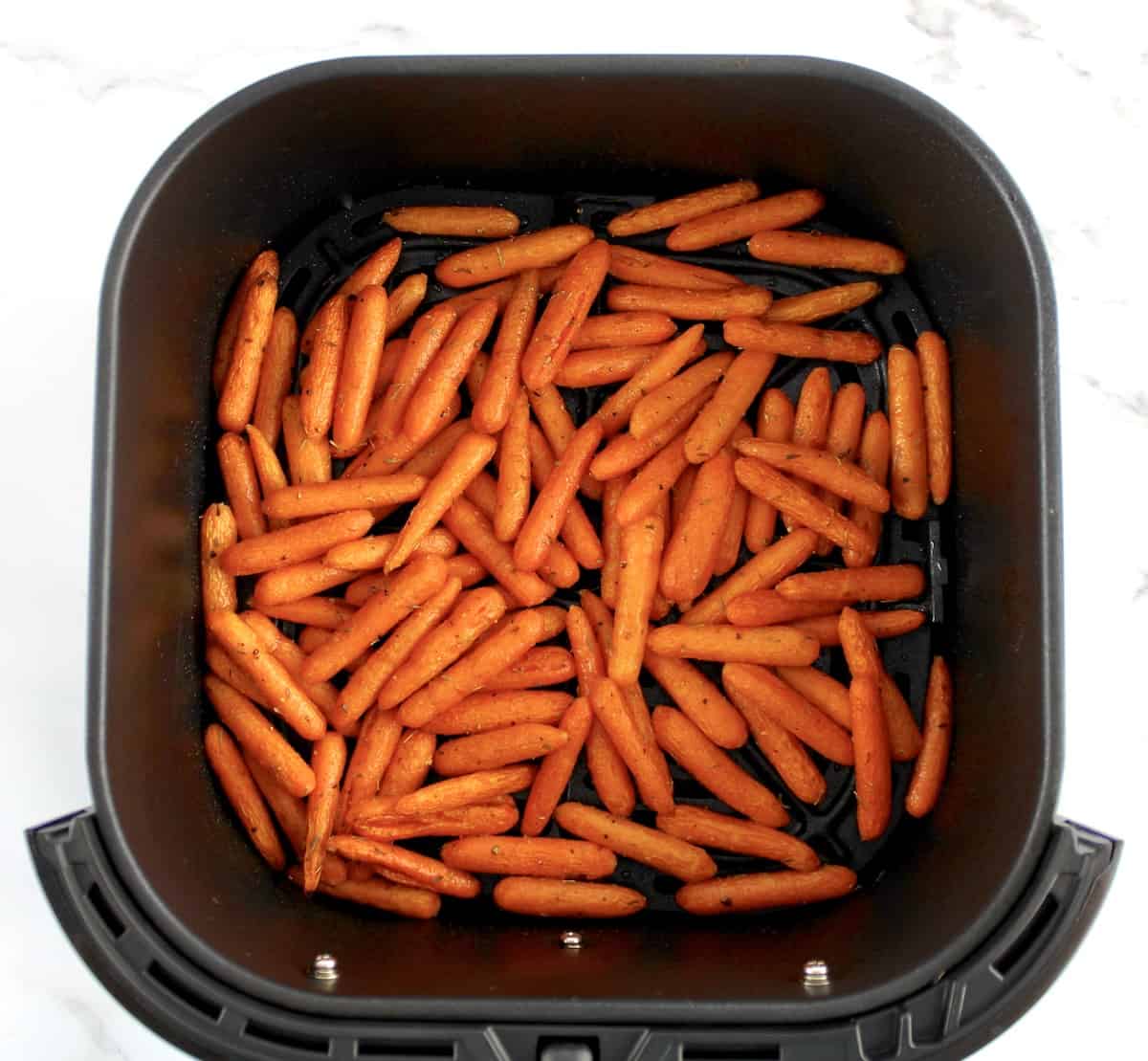 roasted baby carrots in air fryer basket