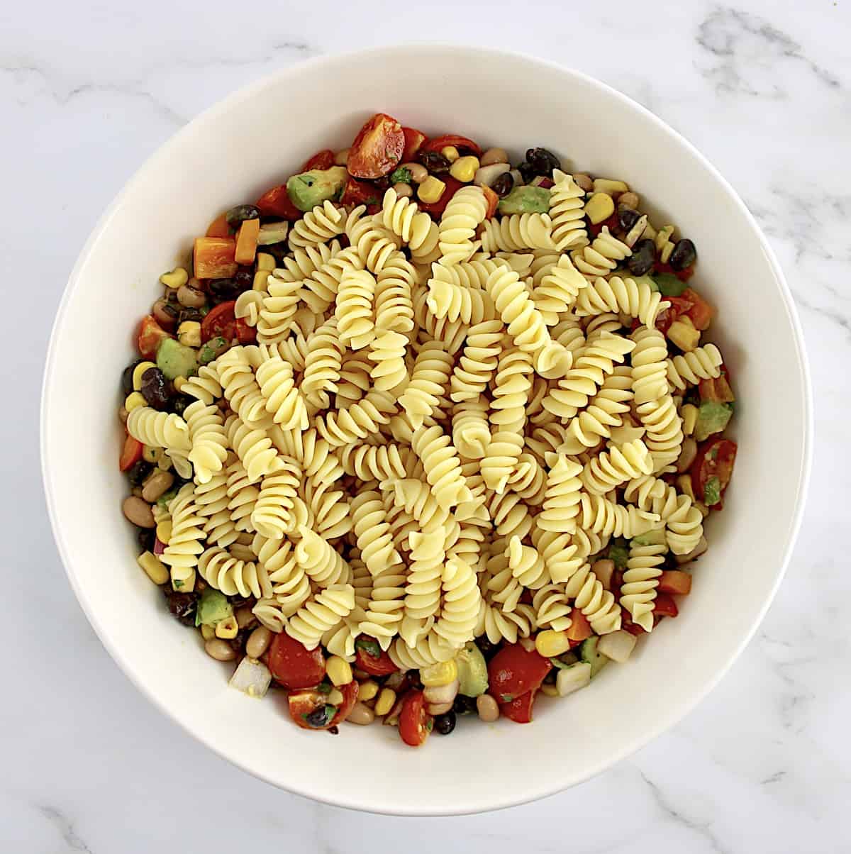 cooked rontini pasta over cowboy caviar