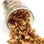 Homemade Granola spilling out of jar