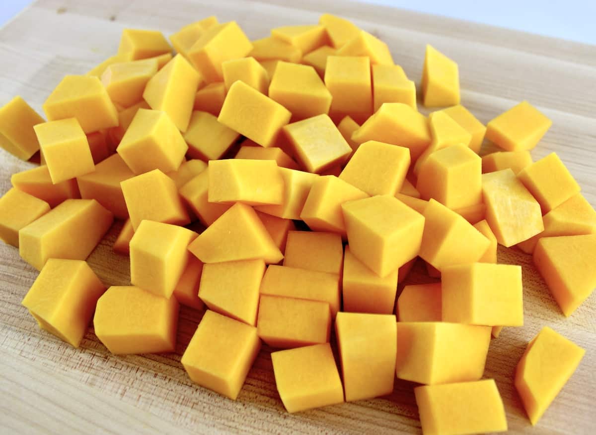 closeup of cubes of Butternut Squash on cutting board