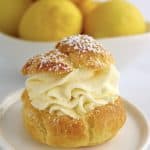 closeup of Lemon Cream Puff with lemons in background
