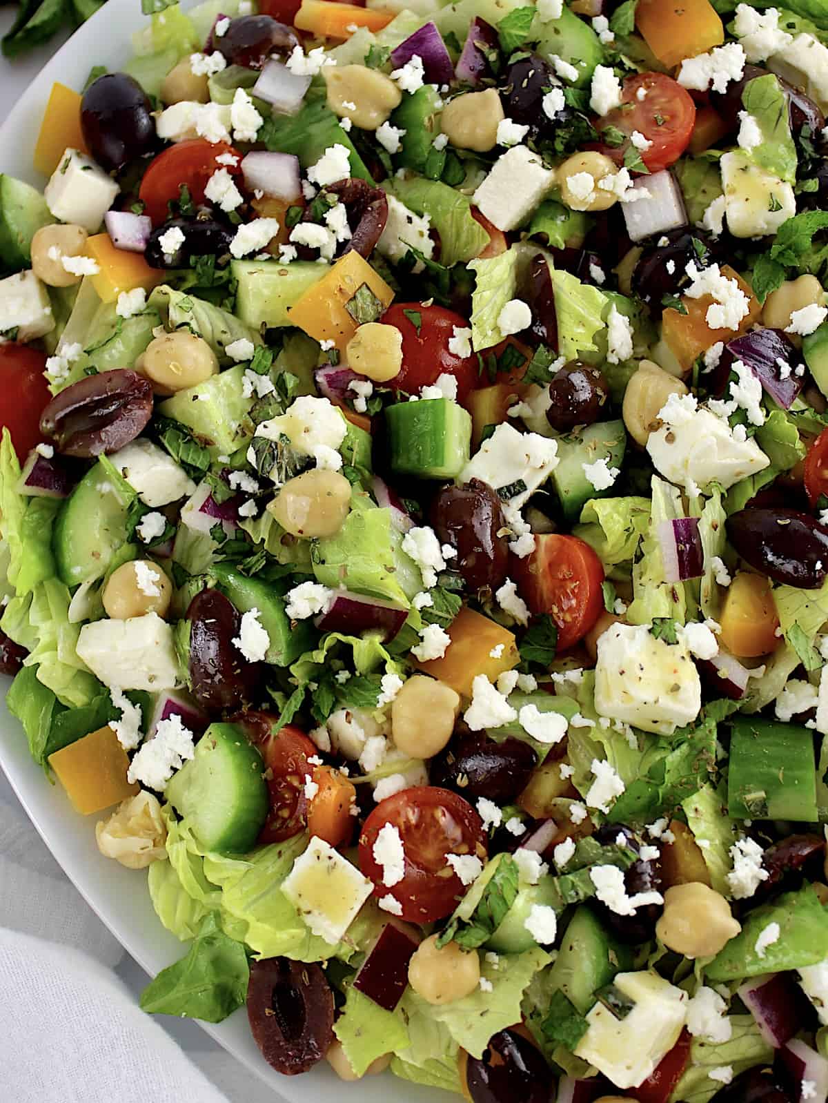 closeup of Mediterranean Chopped Salad in white platter