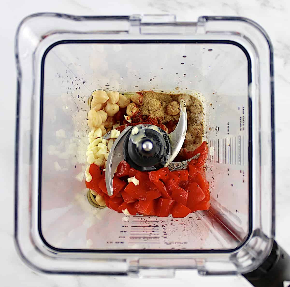 Roasted Red Pepper Hummus ingredients in blender unmixed