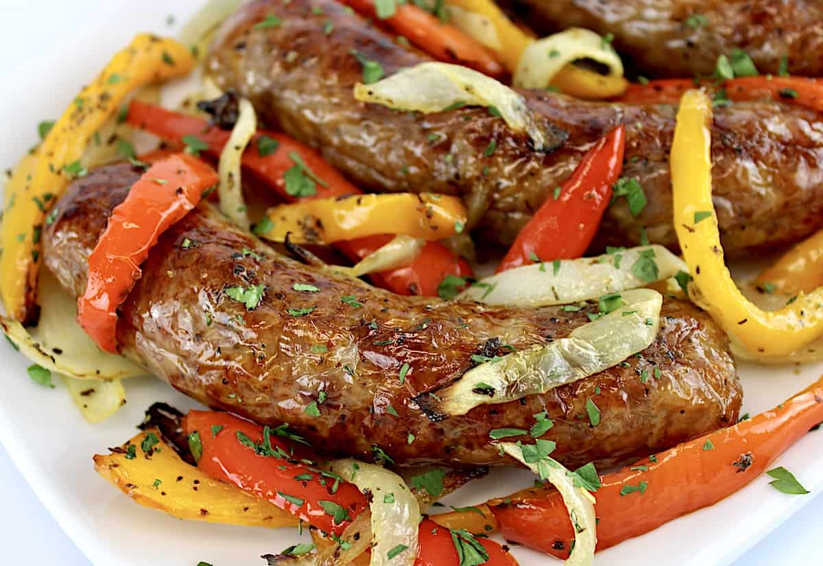 closeup of Air Fryer Italian Sausage and Peppers on white plate