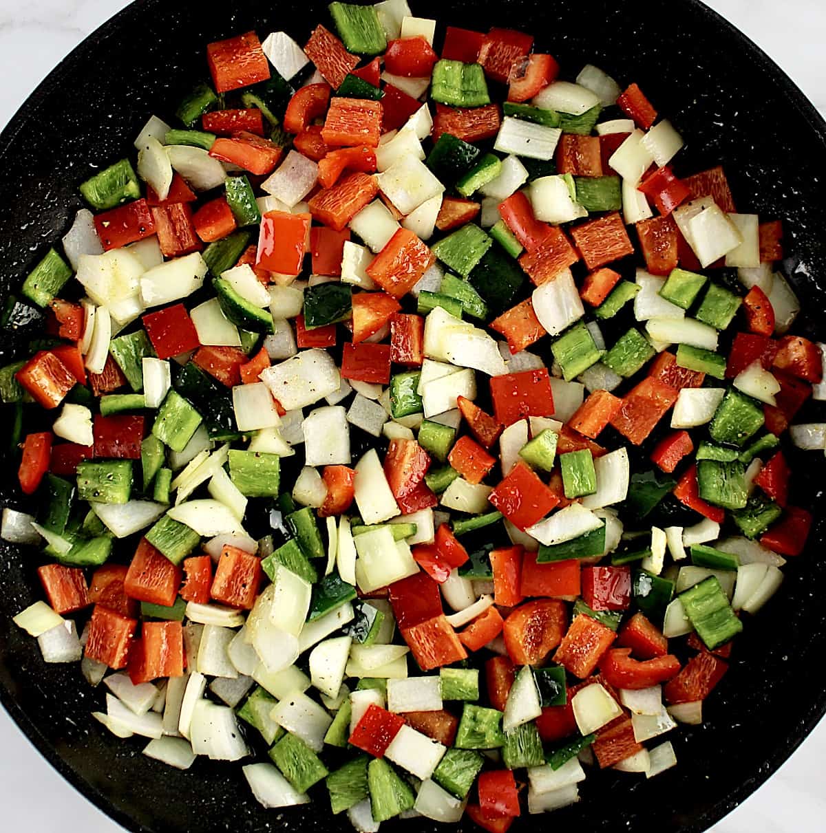 diced red and green peppers with onions