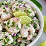 Lime Cilantro Shrimp Salad in bowl with 2 small lime slices