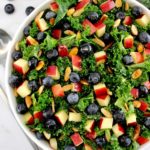 overhead view of Chopped Kale Salad in white bowl