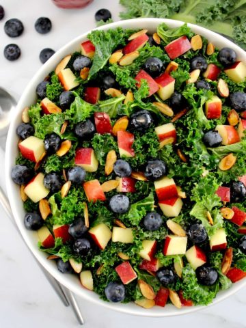 overhead view of Chopped Kale Salad in white bowl