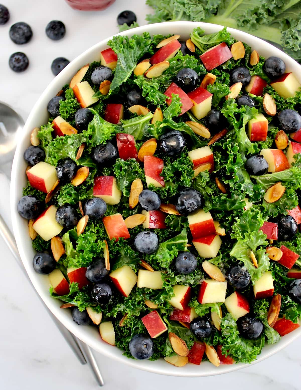 overhead view of Chopped Kale Salad in white bowl