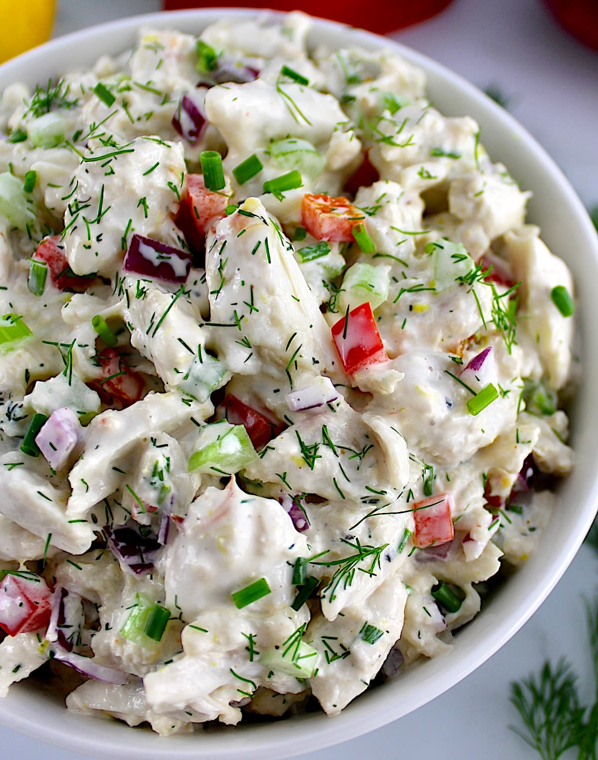 closeup of crab salad in white bowl