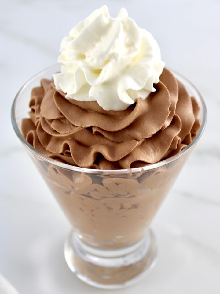 Easy Chocolate Mousse in glass with whip cream on top