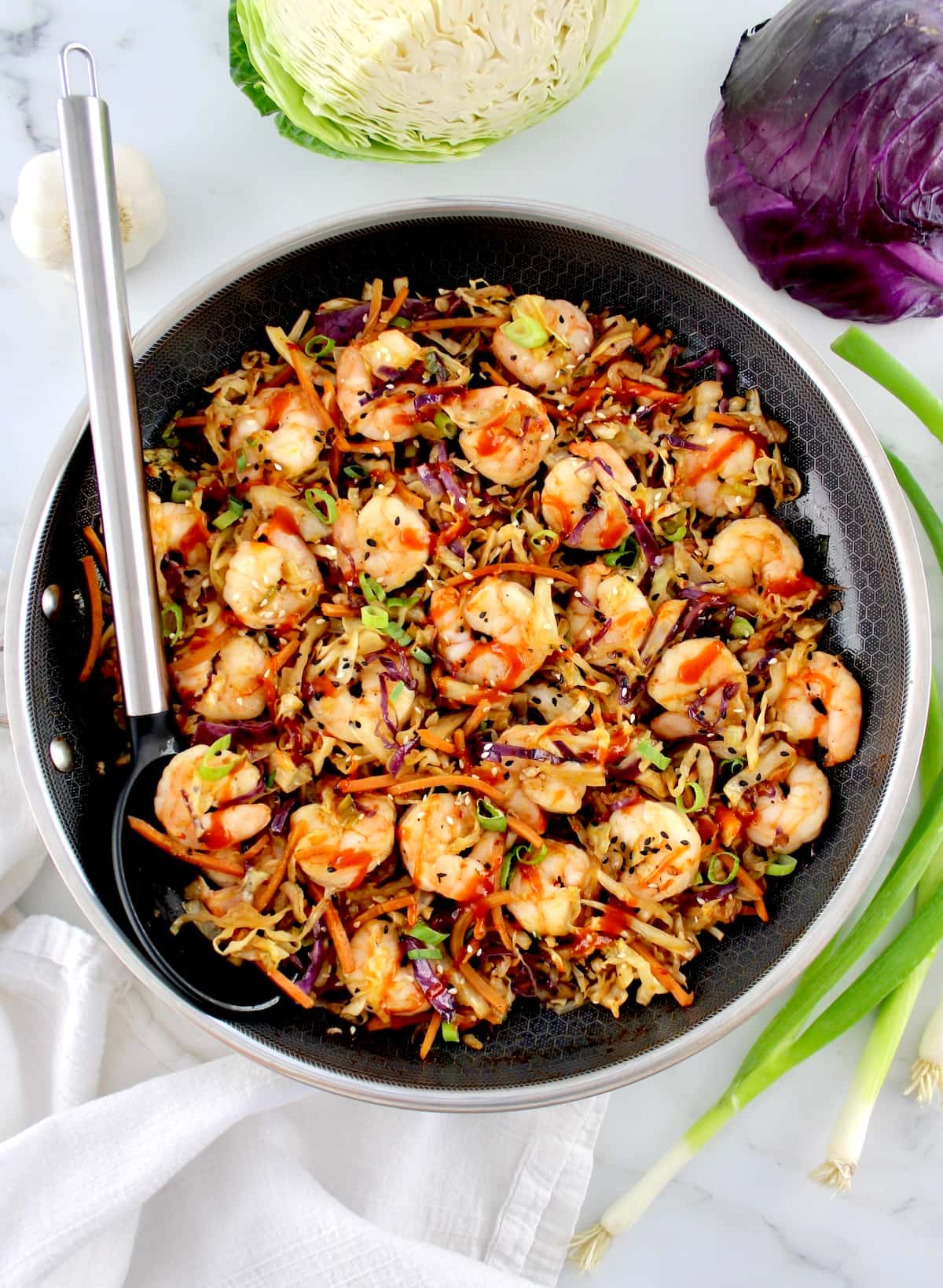 Shrimp Egg Roll in a Bowl in a skillet with serving spoon