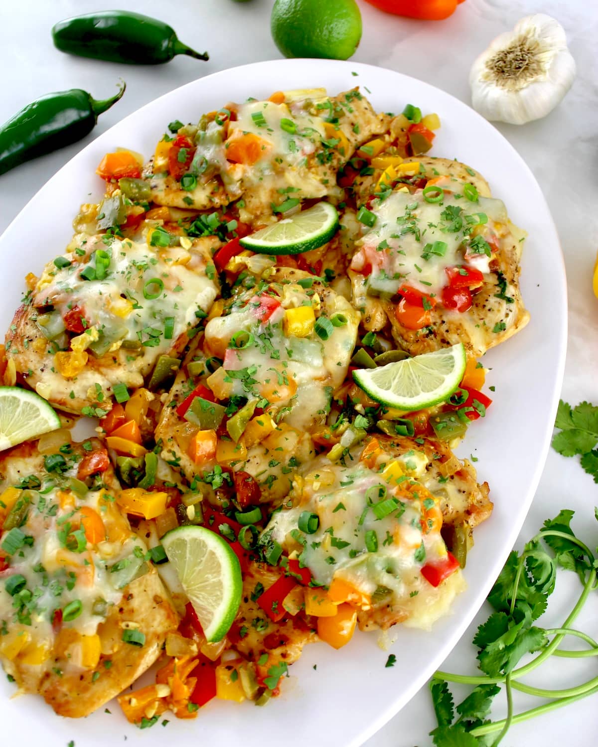 overhead view of Fiesta Chicken on white oval platter