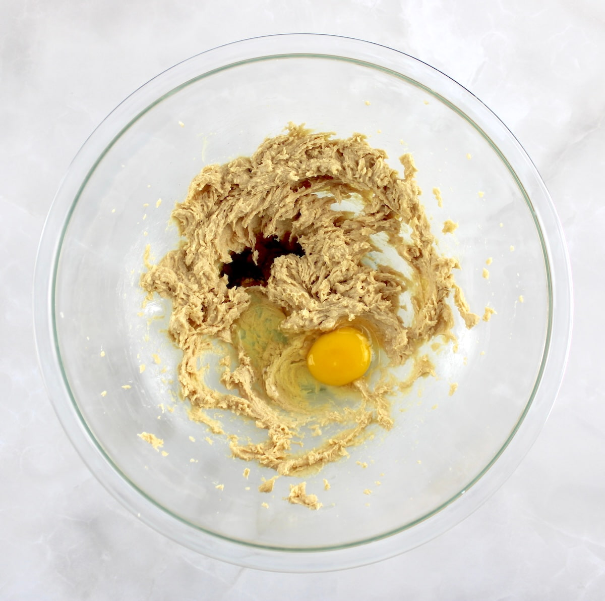 wet ingredients for Pecan Pie Cookies in glass bowl