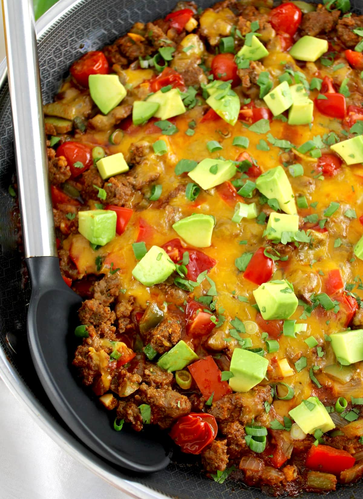 closeup of Taco Skillet in skillet with serving spoon on side