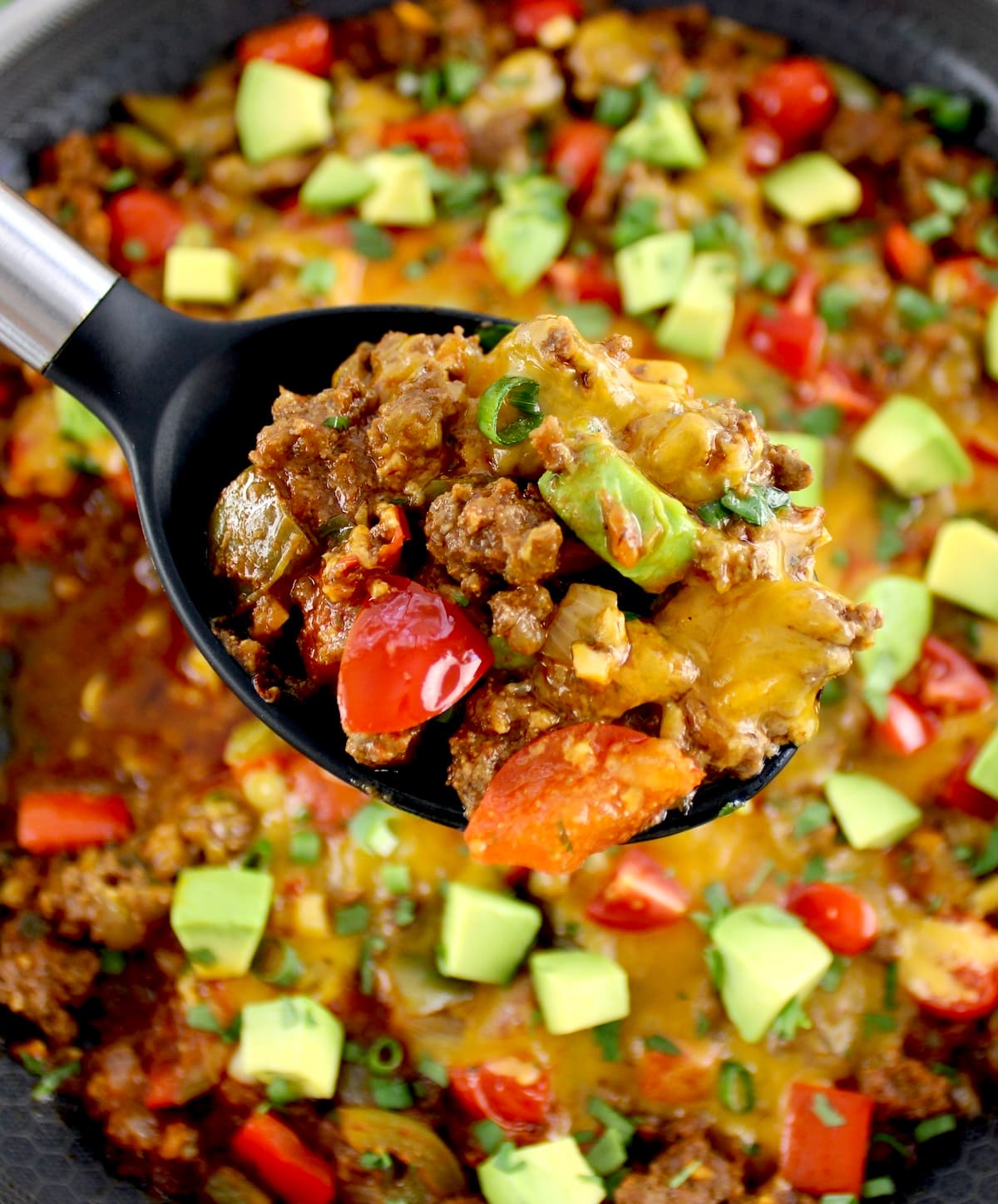 Taco Skillet in serving spoon over skillet