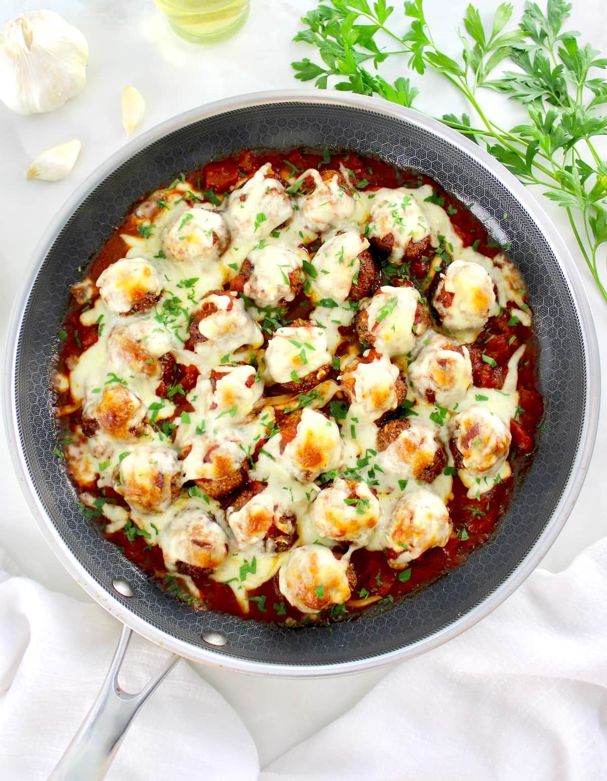 overhead view of Chicken Parmesan Meatballs in skillet