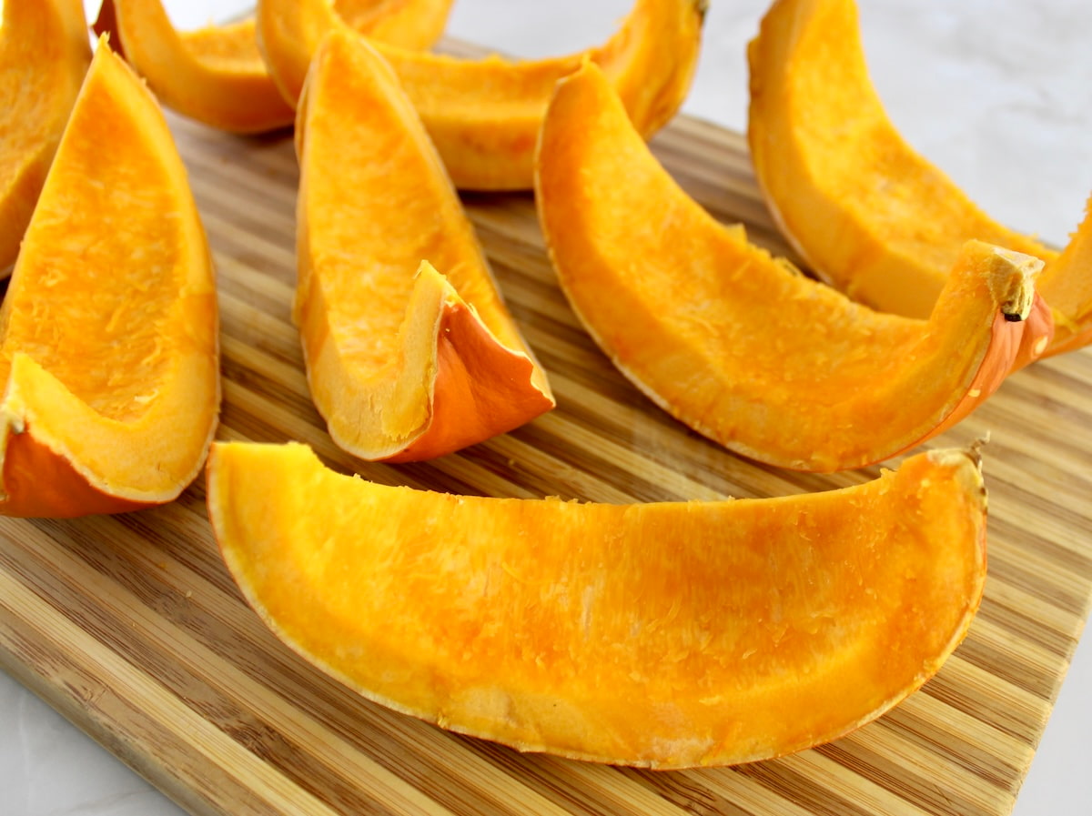 8 pumpkin wedges on cutting board