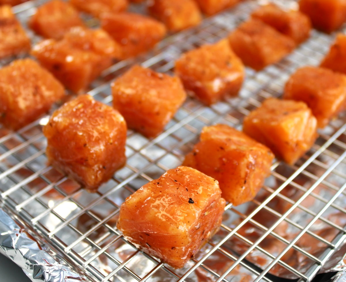 Cajun Salmon Bites uncooked on baking rack