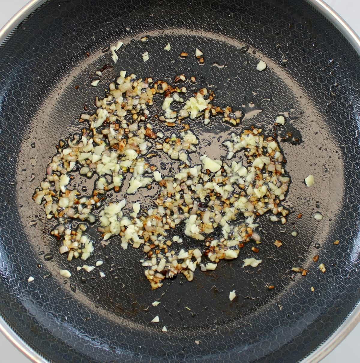 minced shallot and garlic in skillet