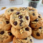 Chocolate Chip Walnut Cookies stacked up on white plate