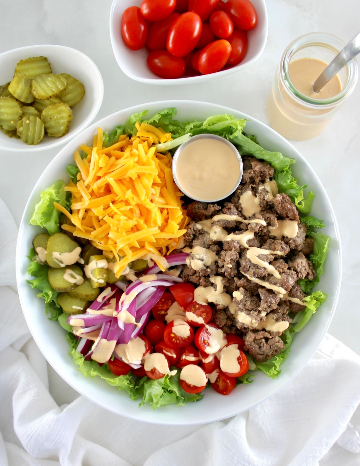 overhead view of Burger Bowl with sauce on top