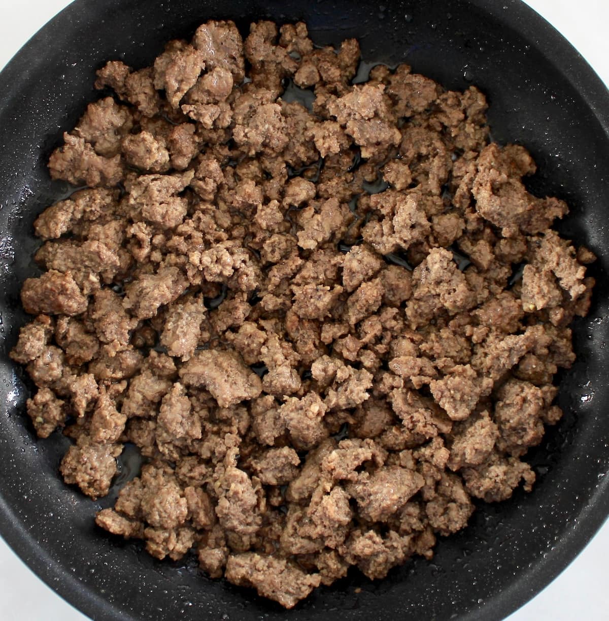 browned ground beef in skillet