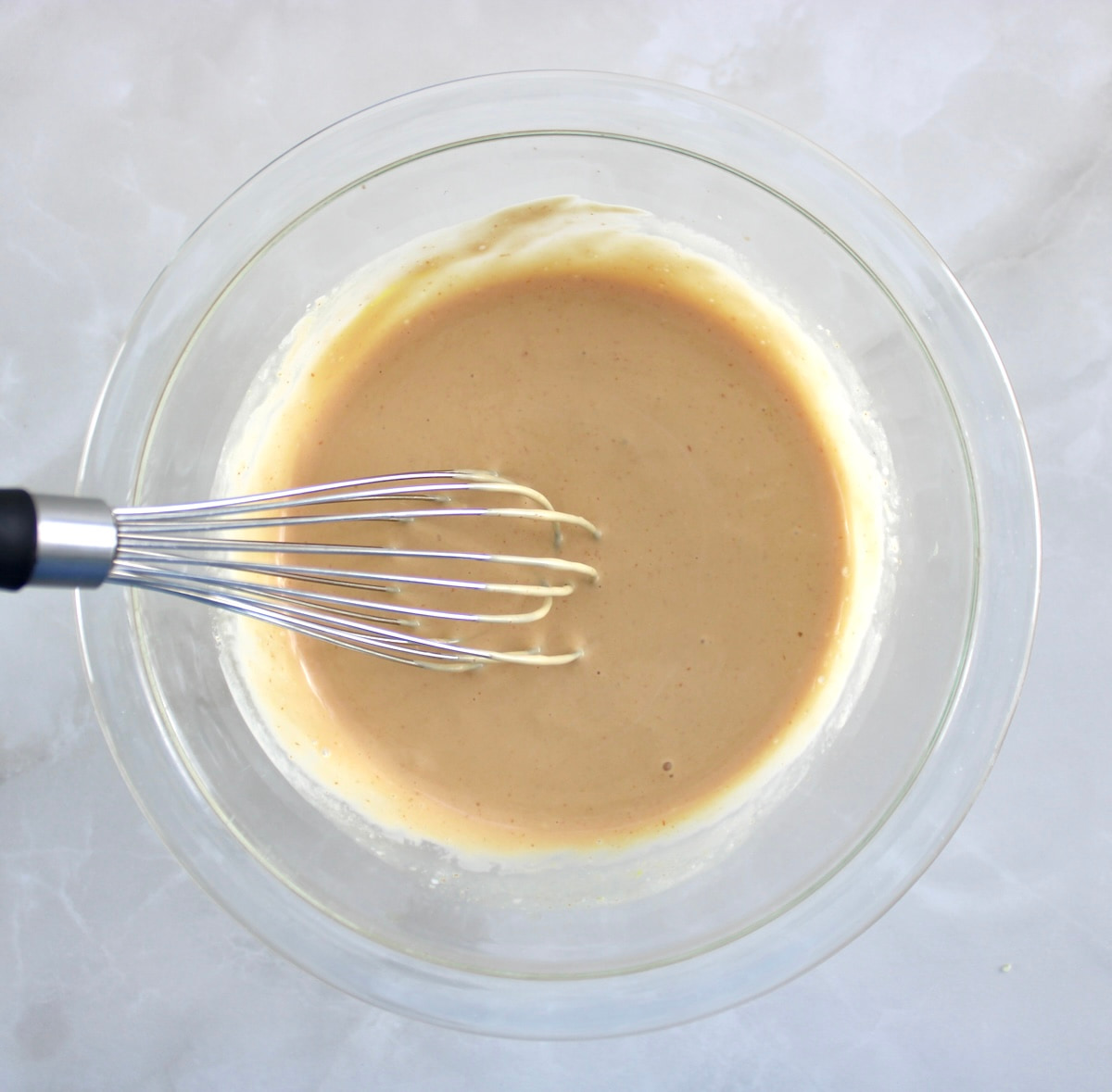 Burger Bowl sauce in mixing bowl with whisk