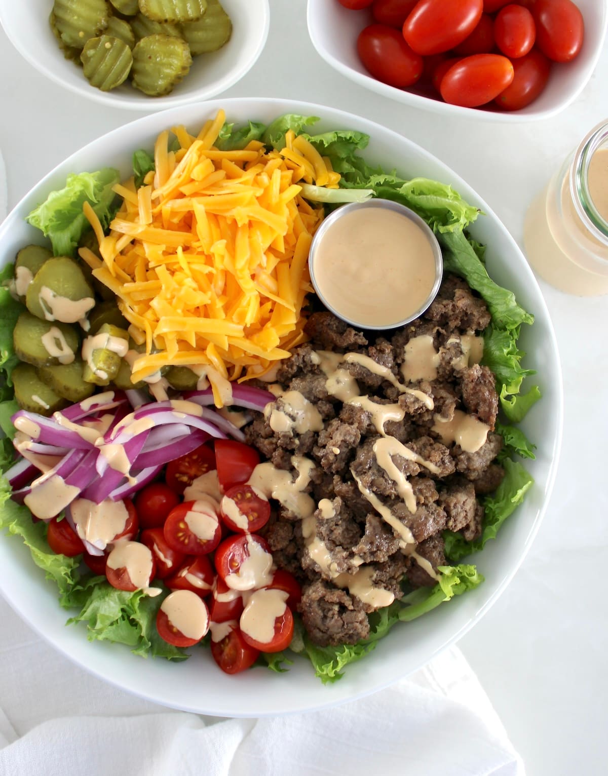 overhead view of Burger Bowl with sauce drizzled on top