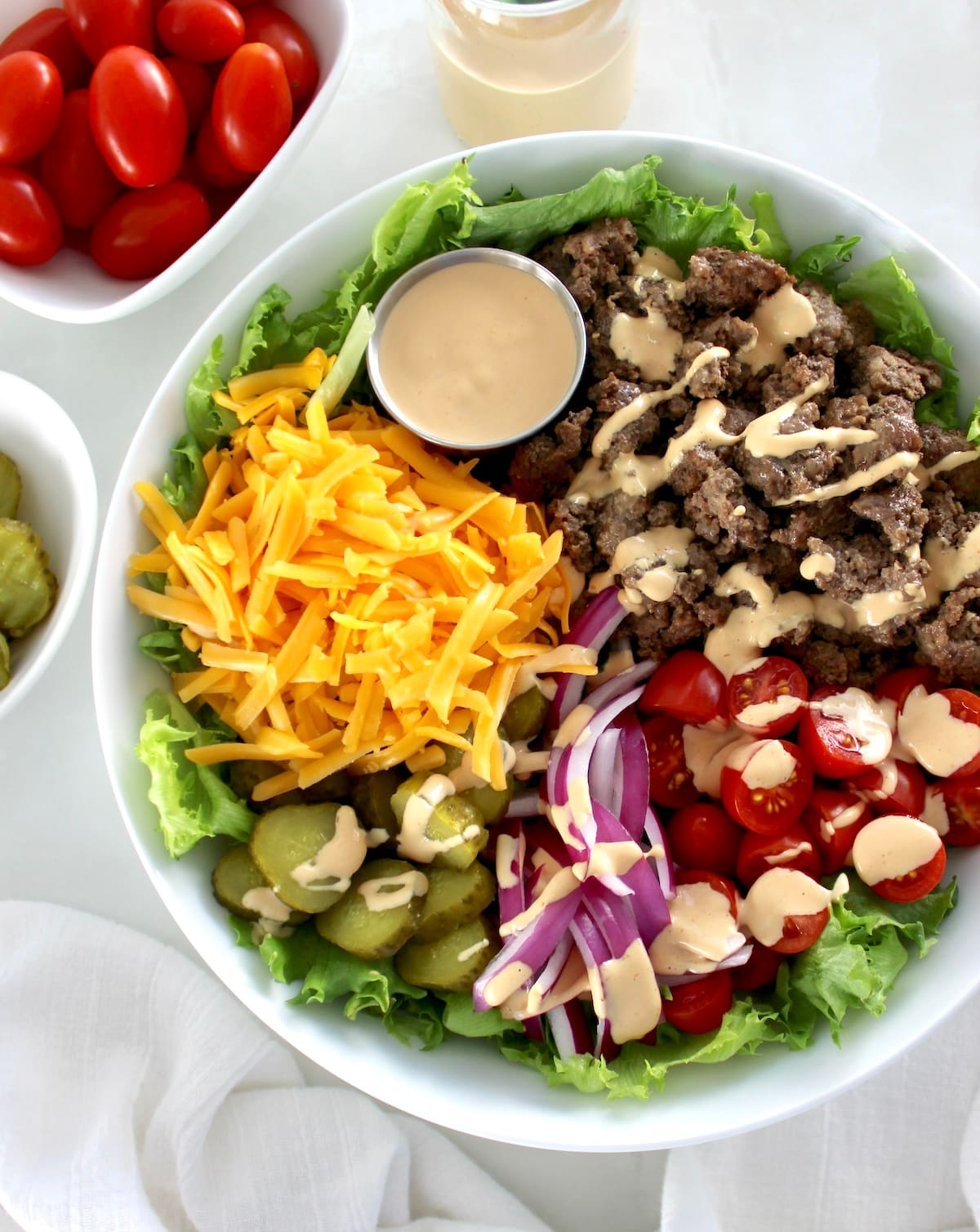 overhead view of Burger Bowl with sauce drizzled on top