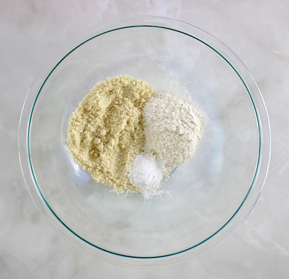 dry ingredients for Cottage Cheese Pancakes in glass bowl unmixed