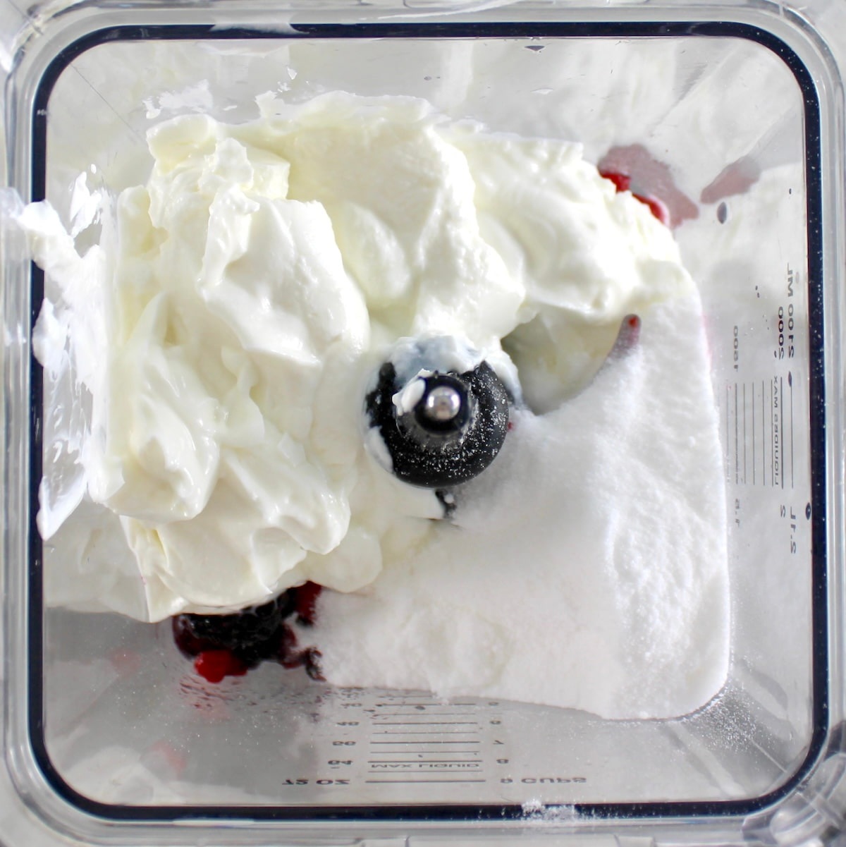Mixed Berry Frozen Yogurt ingredients in blender unmixed
