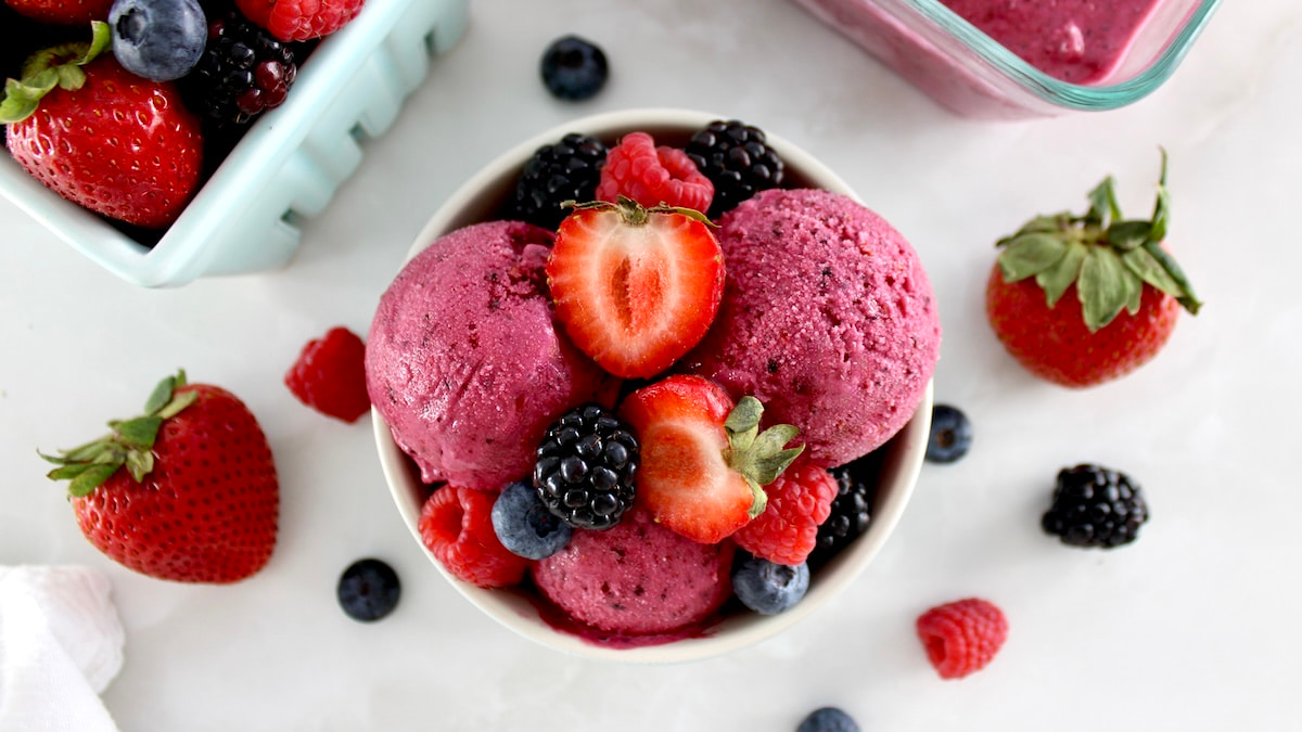 overhead view of Mixed Berry Frozen Yogurt in bowl with fresh berries on top