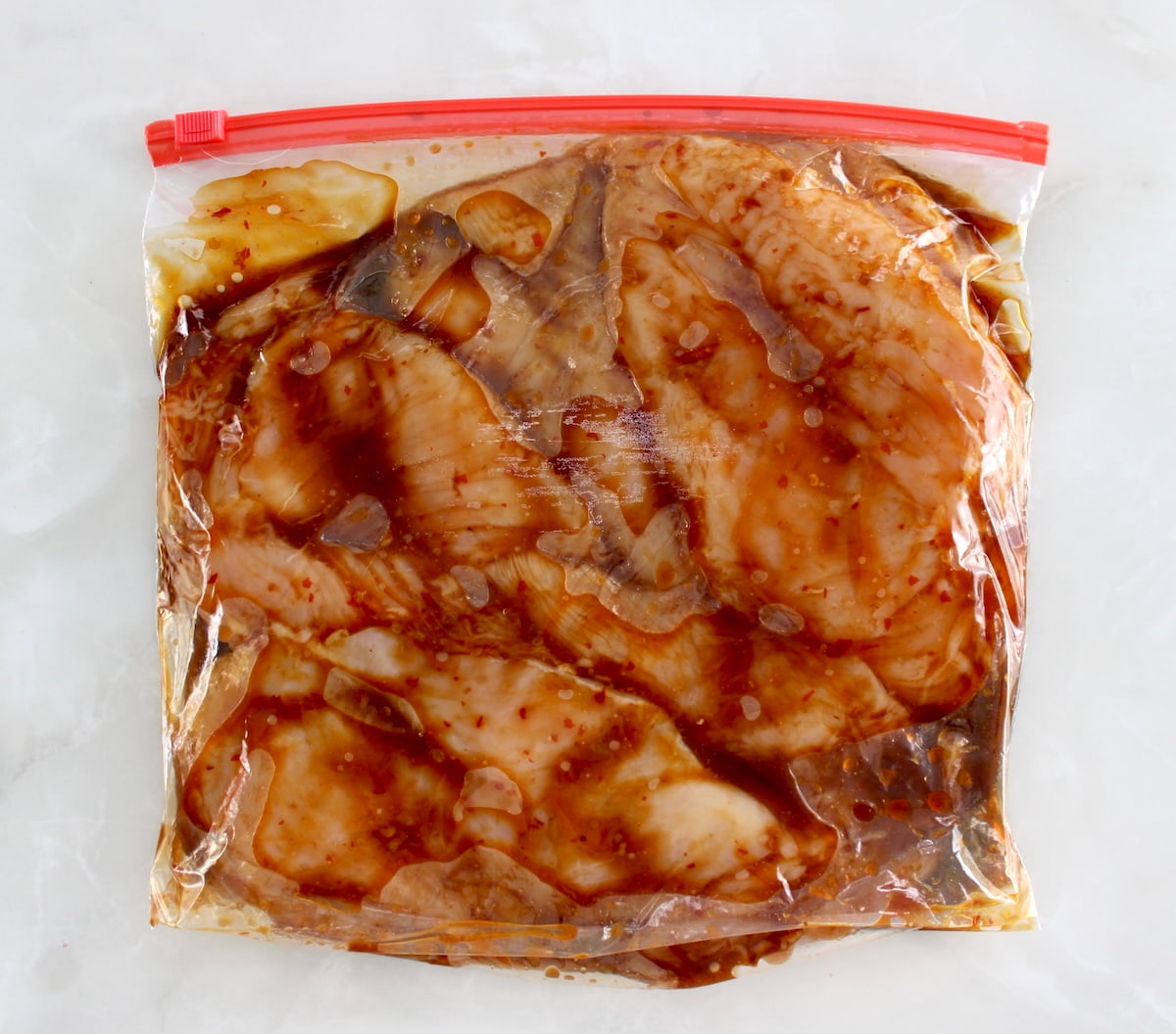 Grilled Asian Chicken marinating in food storage bag