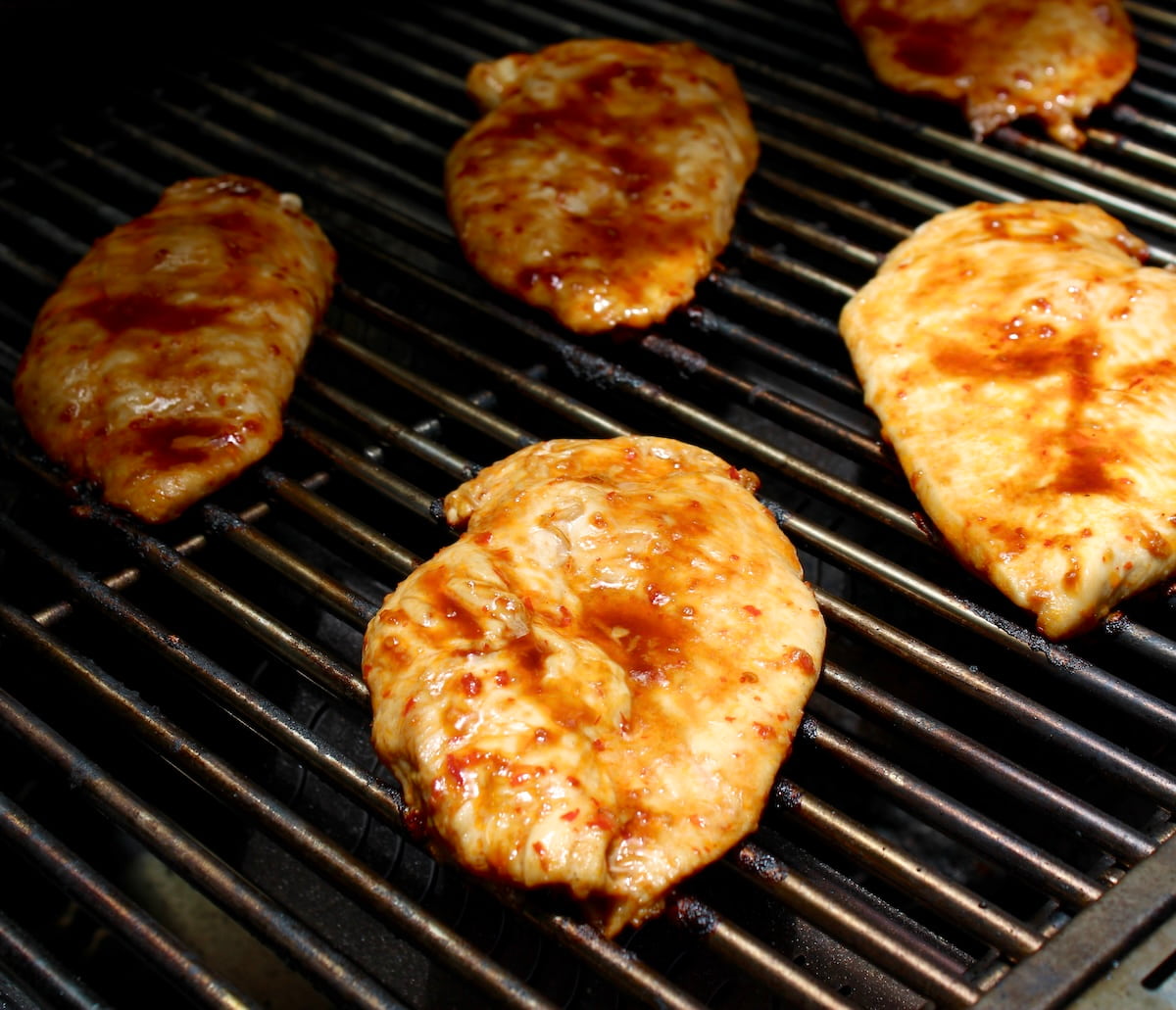 asian marinated chicken on grill