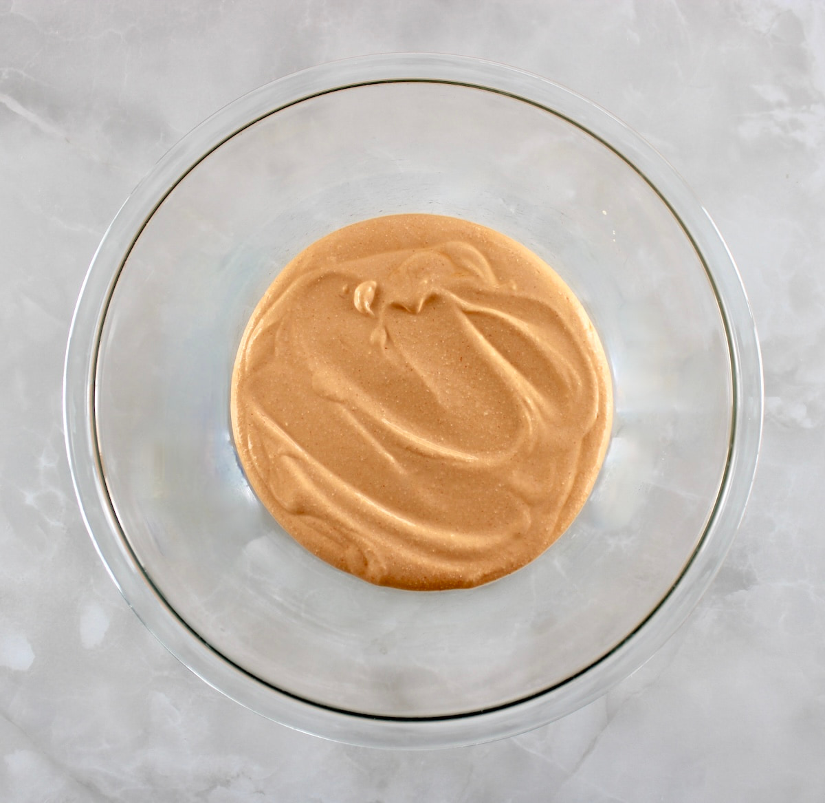 Cottage Cheese Buffalo Chicken Dip sauce in glass bowl